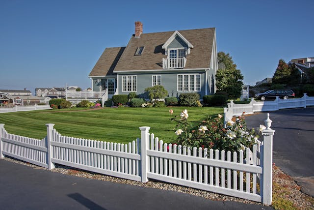 house with aa white picket fence